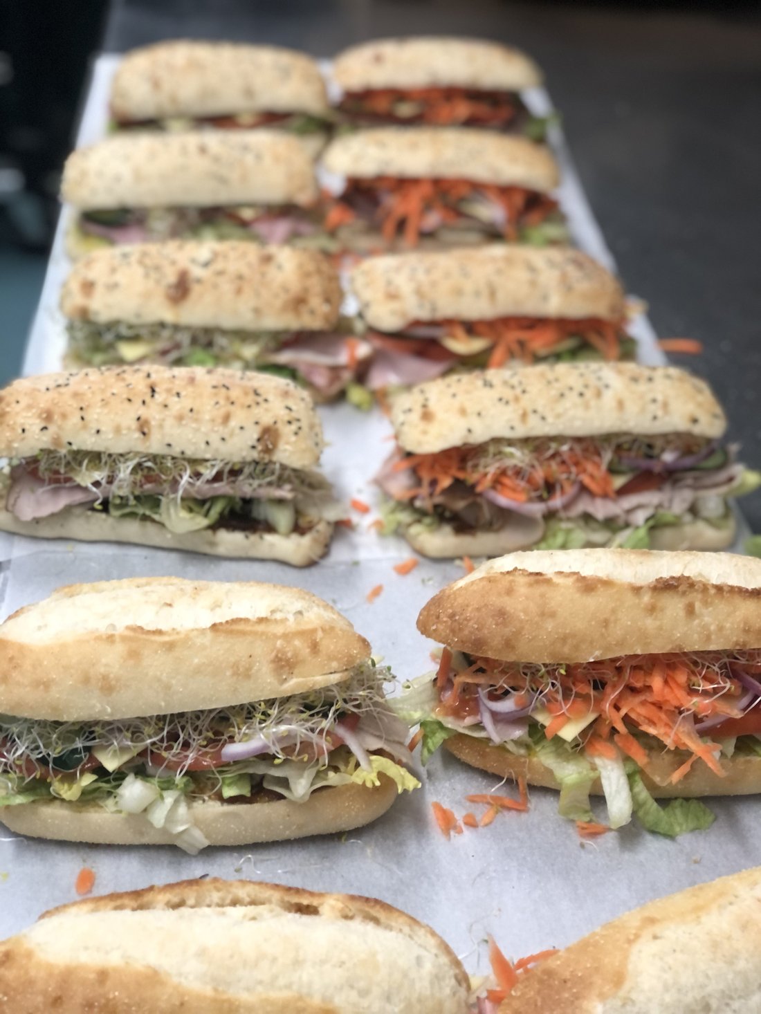 Catering platter of submarine sandwiches.