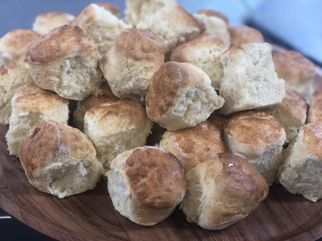 A pile of golden home-baked scones.